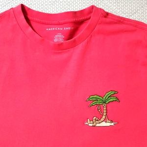 American Eagle T Shirt, size large. Dark Peach color, peace sign palm tree